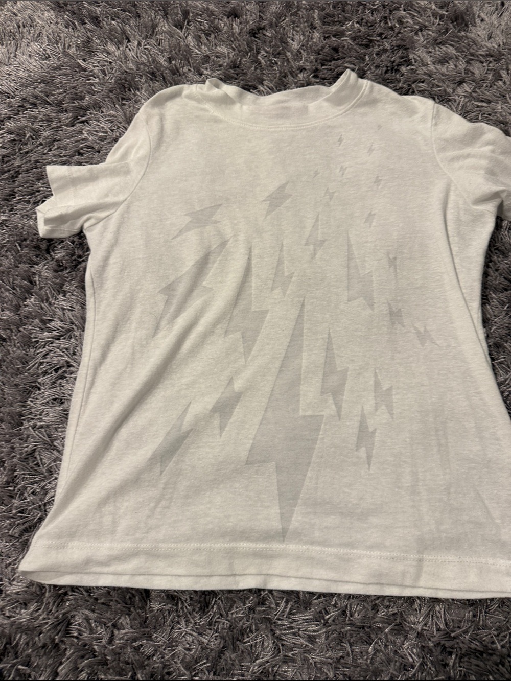 Parker White sheer Tee with subtle lightning bolts on front. Size small